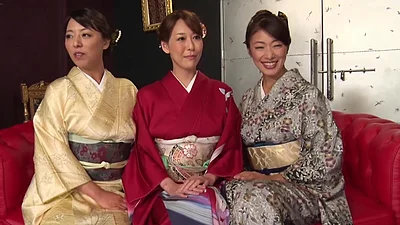 Passionate individuals of Asian descent engage in group sexual activities while wearing traditional kimonos, culminating in prof