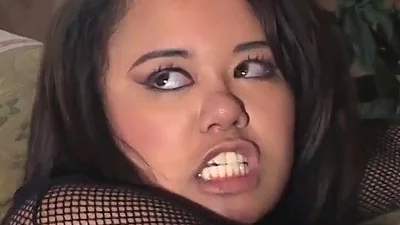 Alluring Asian hottie in fishnets moans while getting humped